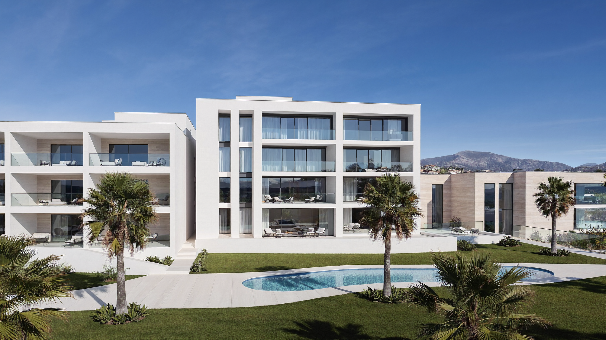 A modern new-build residential development in Marbella with pool, palm trees and sea view